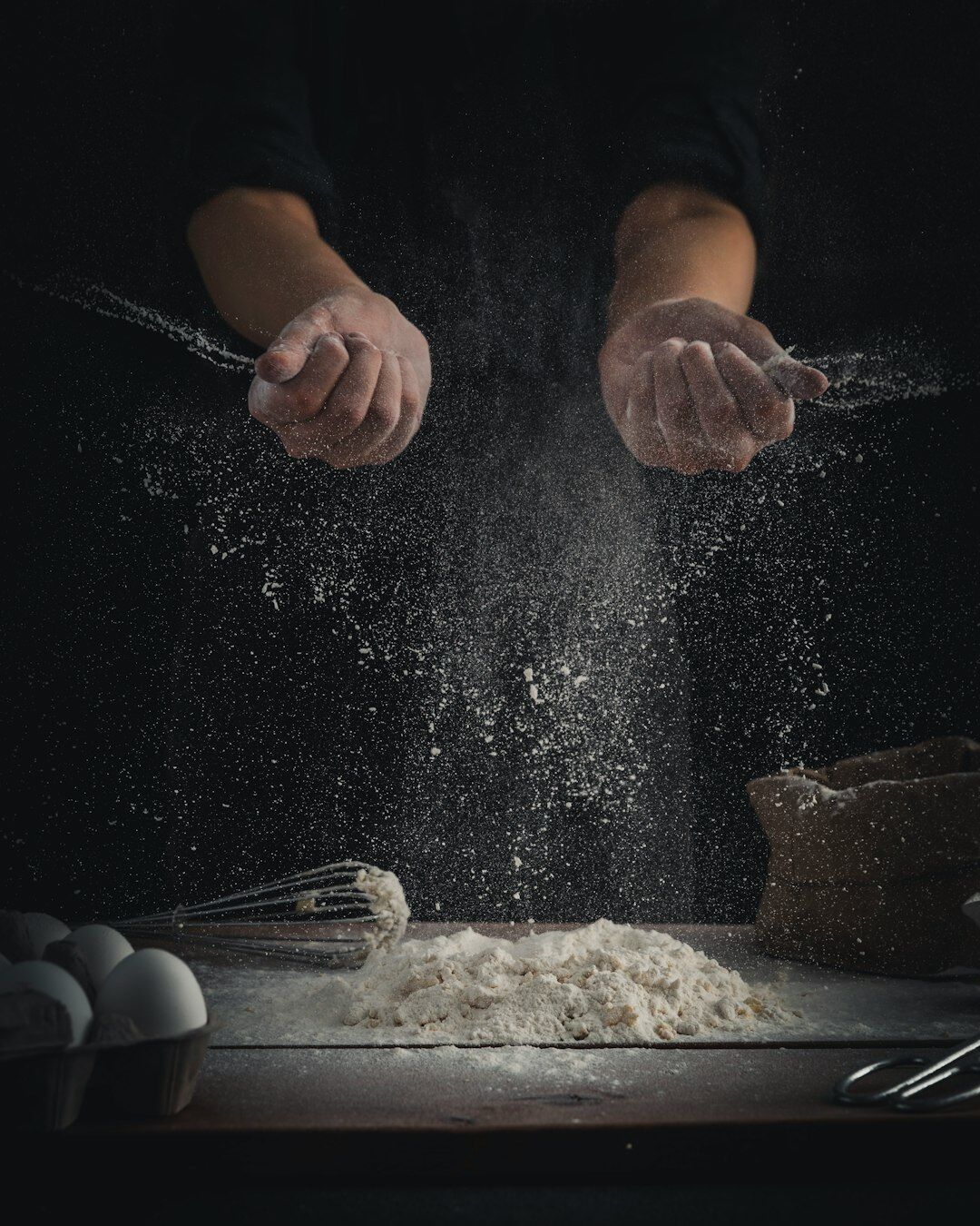 Danish baker portrait dusted with flour in bakery